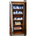 A mahogany veneered open bookcase with five adjustable shelves