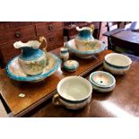 A Victorian Staffordshire china floral blue and gilt decorated toilet set, comprising:  Two
