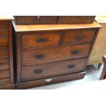 Edwardian mahogany chest of two short over two long drawers, raised on a plinth base