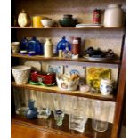 A glazed bookcase of china, glass and collectables