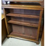 A 19th century mahogany open bookcase with three shelves raised on bracket feet to/w a similar