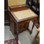 An Edwardian Sheraton style inlaid mahogany davenport with four drawers and opposing dummy