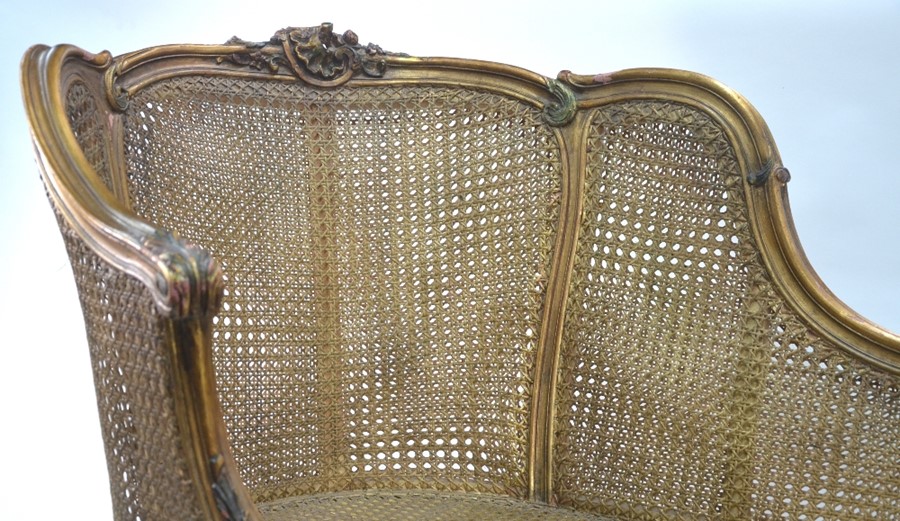 A Louis XV style giltwood framed bergere salon sofa, 140 cm long x 93 cm h o/a (the seat 44 cm h), - Image 3 of 10