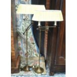 A good quality pair of antiqued brass twin bulb reading lamps, with counter-balanced arms (2)