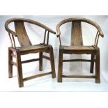 A pair of Chinese elm chairs; each one with horse shoe back and rectangular seat, about 93 cm