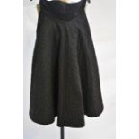A 1950s quilted black full evening skirt and a black wool gabardine pleated skirt - an Estrava