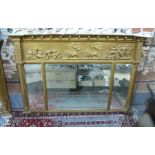 A 19th century French giltwood and composite overmantle, with classical lion drawn chariot and