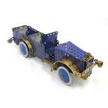 A vintage Meccano model car with gold-painted mudguards and running boards, 42 cm