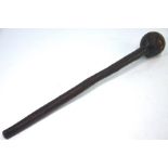 An African wood knobkerie with reeded bulb.  56cm