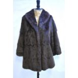 A dark brown squirrel fur jacket, 54 cm across chest, to/w a squirrel fur stole (2)The jacket has