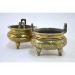 Two Chinese gilt incense burners; each one of typical tripod and circular form with pierced handles;
