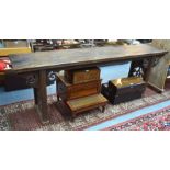 A large antique Chinese nanmu (elm) altar table, the wide well figured and patinated single plank