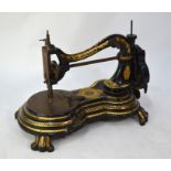 An antique cast iron framed sewing machine 'The Arcadian', engraved for W Triggs, The Arcade,