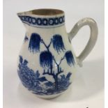 An interesting 18th century blue and white sparrow beak jug decorated in the Chinoiserie style