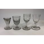 Three 19th century firing glasses or similar, two with engraved bowls, 9.5 - 11.3 cm high to/w a