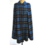A blue/black/white wool tartan reversible capeGood worn condition