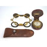 A gilt brass-cased pocket barometer with silvered dial inscribed for Braham Bros Opticians, Bath,