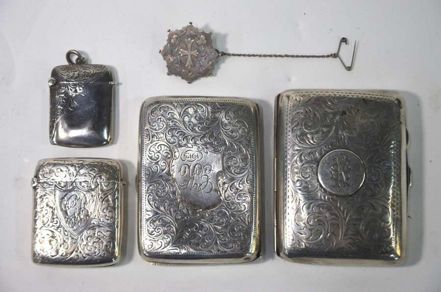 A late Victorian silver foliate engraved vesta case, Thomas Hayes, Birmingham 1896 to/w two - Image 2 of 3