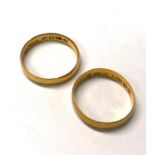 A 22ct yellow gold wedding band, size N to/w a distorted wedding band, size O, approx 5.5g (2)