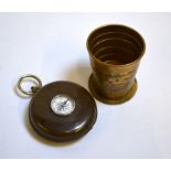 An unusual compass in the form of a half hunter pocket watch enclosing a brass folding beaker, 4.6