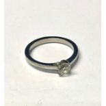A single stone diamond ring, the circular brilliant cut claw set diamond in platinum, size J, approx