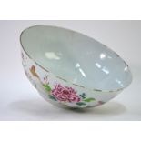 A Chinese famille rose bowl, decorated on the exterior with a typical design of birds perched beside