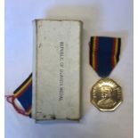 An 'Idi Amin' Republic Of Uganda Distinguished Service Medal 1962-1971 by Spink, London, card box of