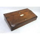 A Victorian mother of pearl inlaid rosewood slope top writing box, the interior with tooled
