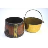 An 18th century iron-bound oak pail with brass mounts and single ring handle, 20 cm diam, to/w a