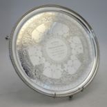 A Victorian silver letter salver with engraved decoration and beaded rim, on claw and ball feet,