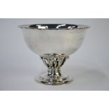 Georg Jensen - a silver Louvre pattern bowl shape 1808, on leaf and berry open-work stem and moulded