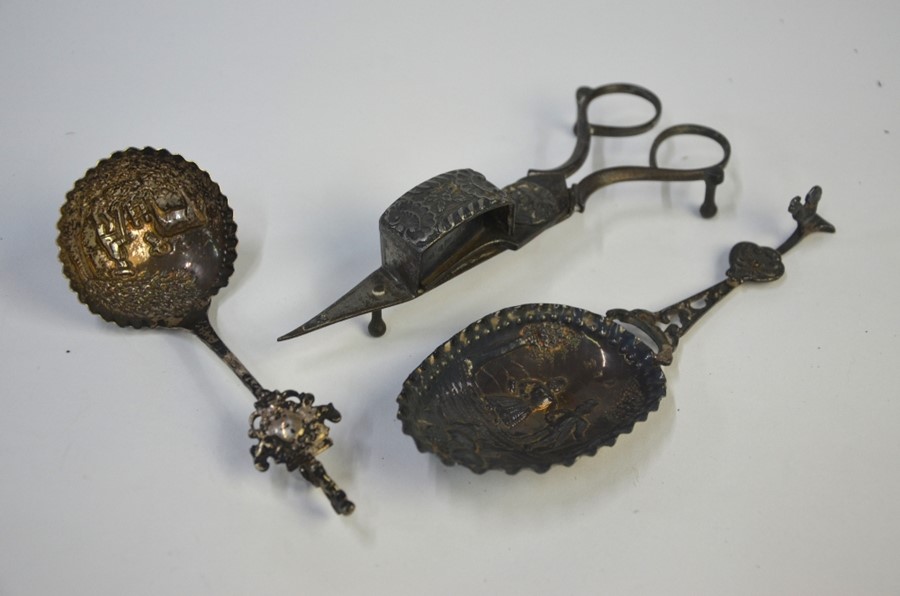 A late Victorian Continental silver marriage spoon with embossed bowl and cast stem, London import