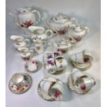A collection of Royal Crown Derby 'Derby Posies' and similar tea and coffee wares, including:  Two