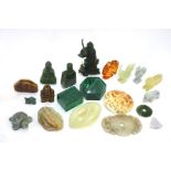 A number of small jade, or other, objects, including: an archaistic bi, 8.5 cm diameter; an oval