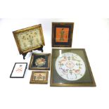 A Victorian crossstitch sampler with birds, cherubs and vases of flowers, Eliza Baker 1845, 18 x