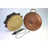 A vintage three-tone train whistle, to/w a tambourine and a circular copper hot-water bottle (3)
