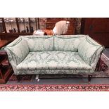 A late 19th/20th century two seat sofa, the green leaf design satin upholstery with contrasting rope
