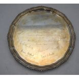 A pie-crust silver letter salver with gadrooned rim on scroll feet, C J Vander Ltd, Sheffiled