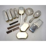 A mixed selection of silver-backed hairbrushes, mirrors and combs (14 pieces)