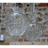A contemporary pair of glass crystal hung ceiling light fittings, 30 cm dia. x 45 cm, both a/f  (2)