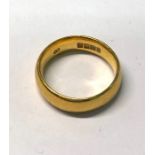 A 22ct yellow gold wedding band, size N, approx 7.9g