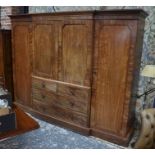 A good quality Victorian mahogany breakfront compactum, centred by a pair of panelled cupboards over