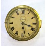 A brass cased Swiss movement bulkhead clock, 18 cm dia.