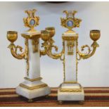A fine pair of 19th century French Louis XVI style ormolu mounted alabaster twin arm candelabra,