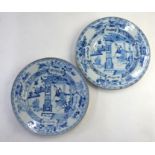 A pair of Chinese Export blue and white plates; each one decorated with two high ranking Manchu/