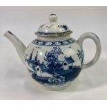 An 18th century Lowestoft teapot and cover of globular form and plain handle, painted in