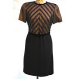 A black wool crepe dress suit with chevron chiffon bodice and velvet belt and matching jacket with