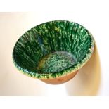 A large and rustic 19th century Italian terracotta green and cream glazed passata bowl, 20 cm high x