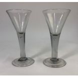 Two 18th century style wine glasses - drawn trumpet bowl, plain stem with teardrop, folded foot