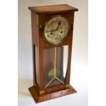 An Arts & Crafts and Art Nouveau influenced 1930s mantle clock, with Archibald Knox style brass